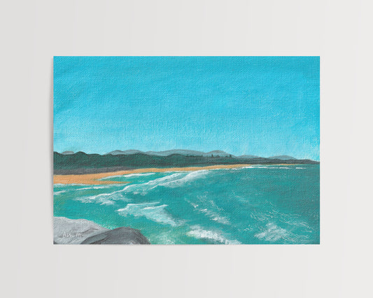 Painting of a coastal scene at North Wall Beach, Coffs Harbour, with blue water and waves and clear sky.